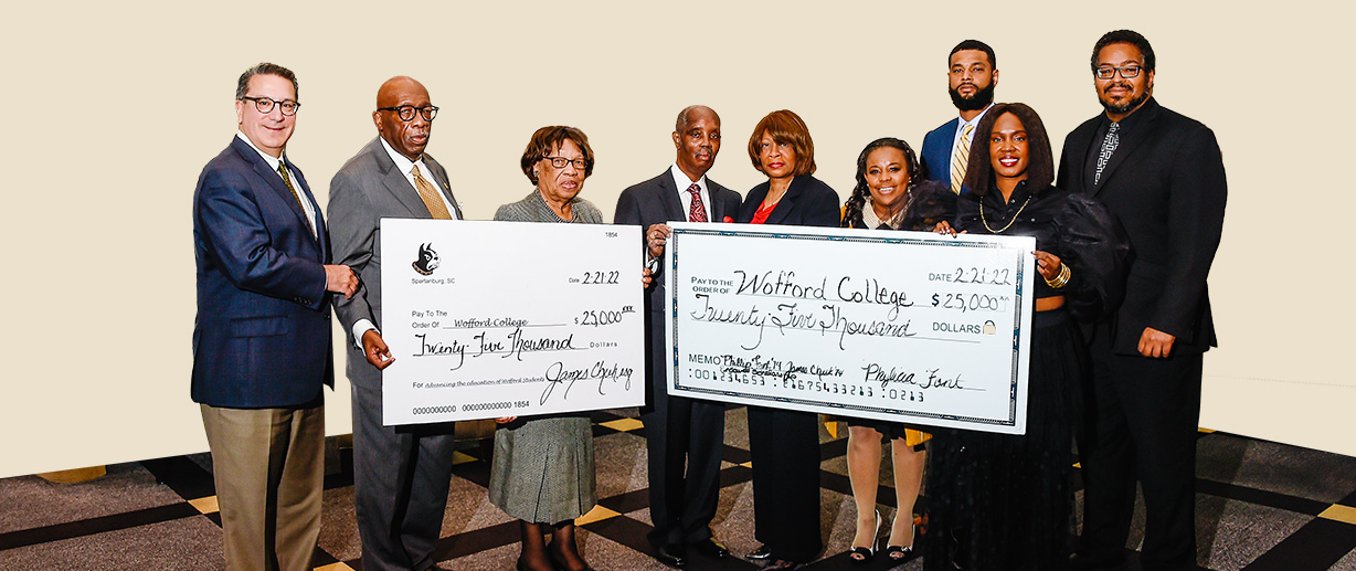 President Dr. Nayef Samhat with members of the Cheek and Fant families who are supporting the college by establishing endowed funds. From left, Samhat; James Cheek ’73; Myrtle Cheek; Phillip Fant ’74; Margaree Fant; Anneliesa Finch, a Wofford leadership gift officer; Eric Cheek; Phylicia Fant and Dr. Dwain Pruitt ’95, Wofford’s chief equity officer.