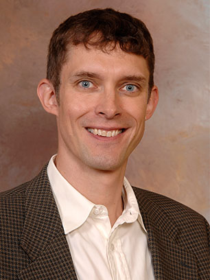 Dr. Clayton J. Whisnant