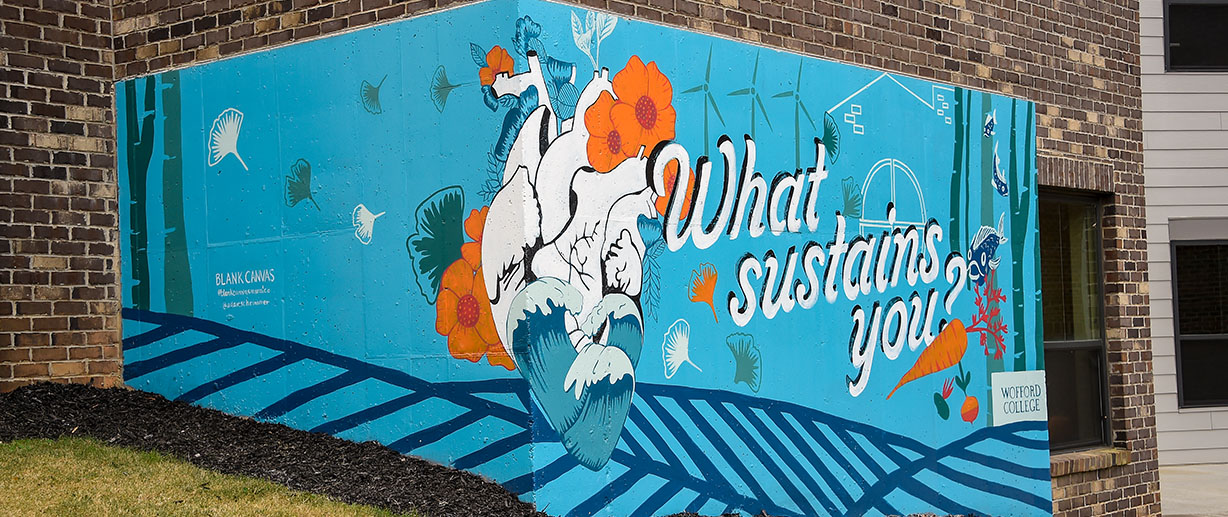 A mural painted on the Wofford Northside Apartments for students in the Northside LLC.